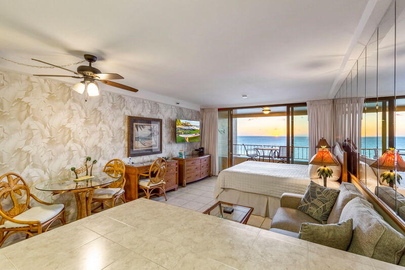 Maui Kai 806 bedroom with California King bed, iron, ironing board, and laundry basket provided