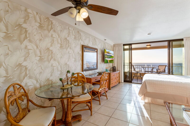 Maui Kai 806 living area with Tommy Bahama furniture and stunning ocean backdrop, Maui vacation rental